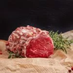 mettre la viande dans le torchon signification origine definition